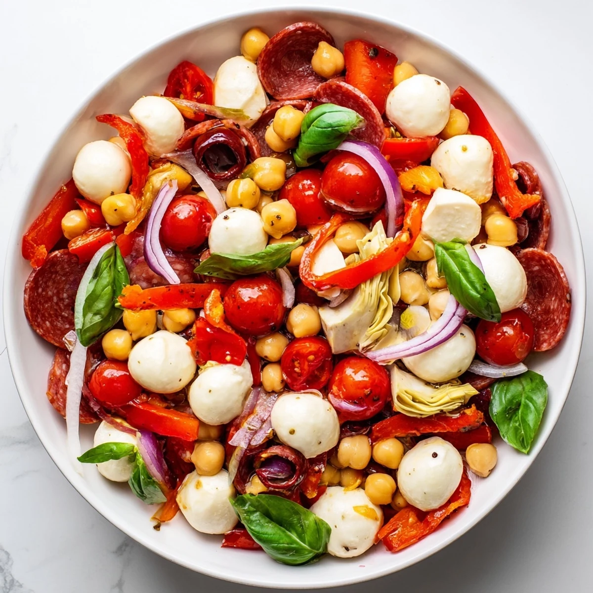 This Antipasto Chickpea Salad showcases a medley of Italian flavors, tossed in a tangy vinaigrette.