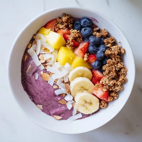 These simple Breakfast Smoothie Packs offer a quick morning meal blended with yogurt, perfectly pictured.