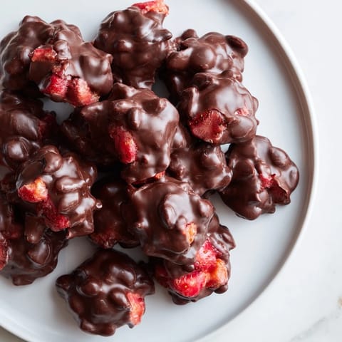 A delightful view of chilled Strawberry Yogurt Clusters ready to eat, a healthy snack option.