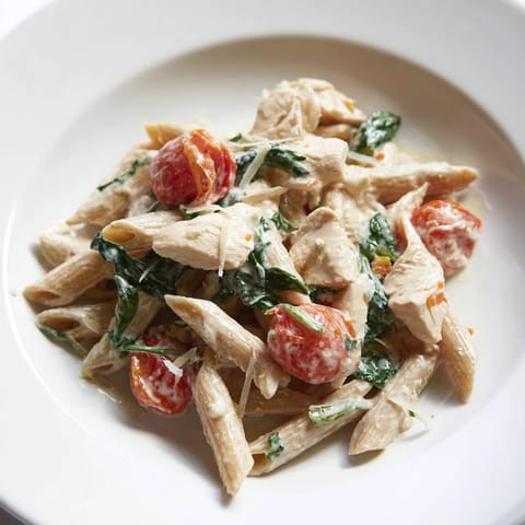 Golden chicken pieces and luscious Greek yogurt sauce tossed with al dente pasta for a high-protein dinner.