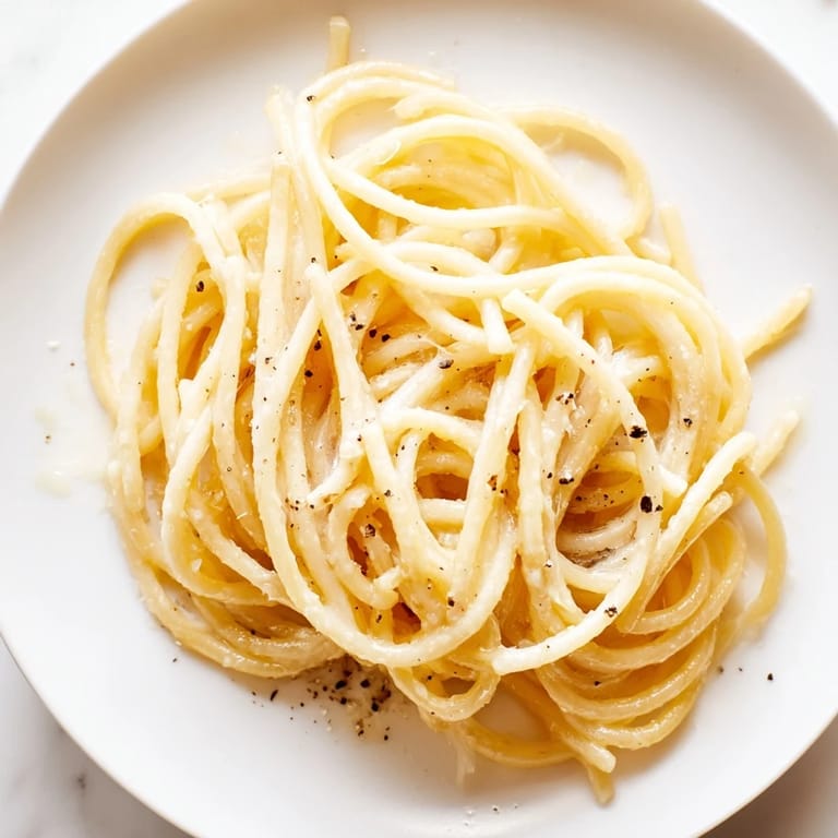 Quick and easy Lazy Girl Three-Ingredient Pasta, a comforting vegetarian meal perfectly cooked al dente.